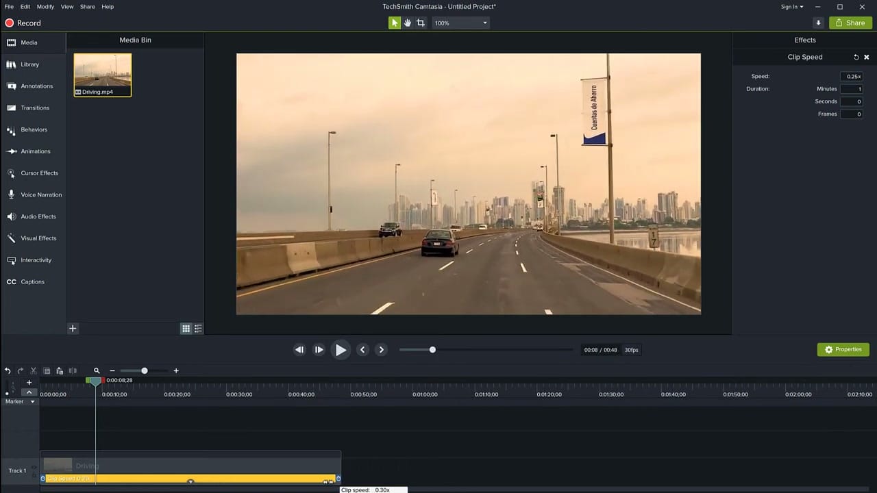 Dragging the edge of the Clip Speed effect on the Camtasia timeline with tooltip showing 0.30x