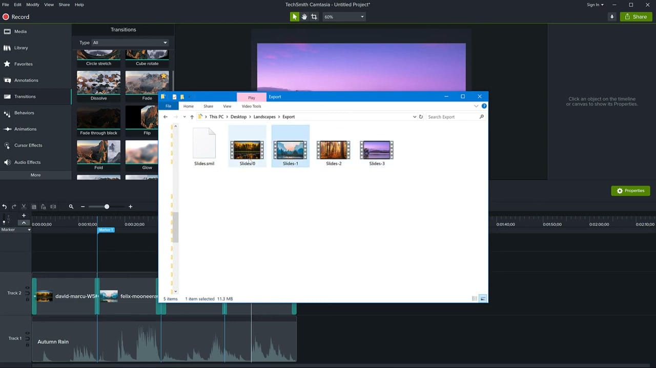 Windows File Explorer showing four exported MP4 files named Slides-0 through Slides-3