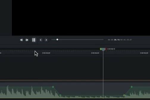 Camtasia timeline zoomed in showing audio waveform with custom volume curve created by keyframe points
