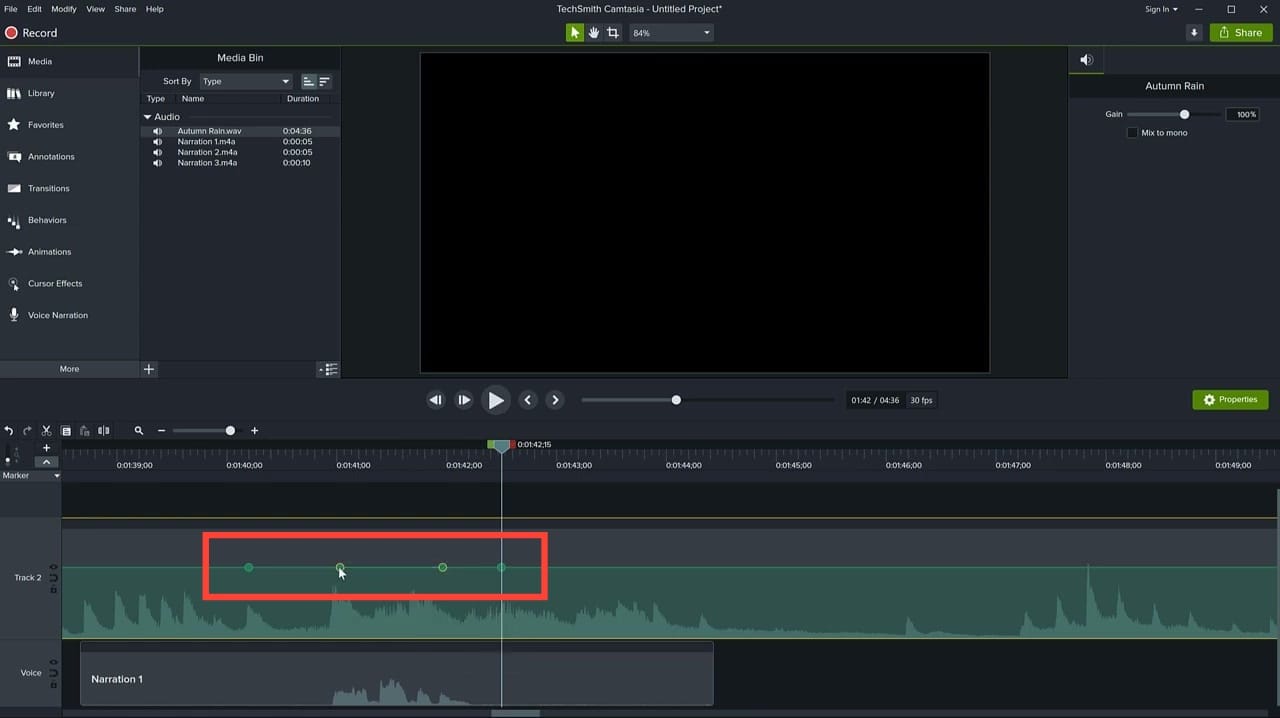 Camtasia timeline zoomed in showing four green keyframe points on the music track volume line